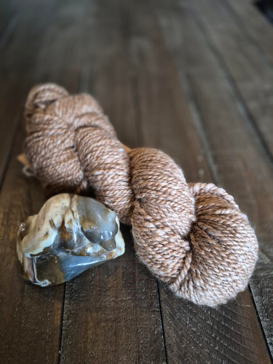 Alpaca/Rambouillet/Tussah silk.  Worsted